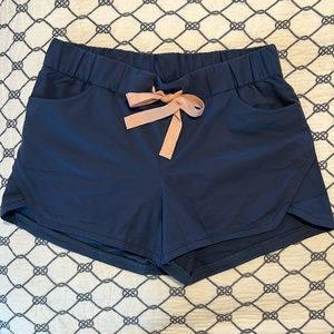 Pearl Izumi blue athletic shorts. Medium